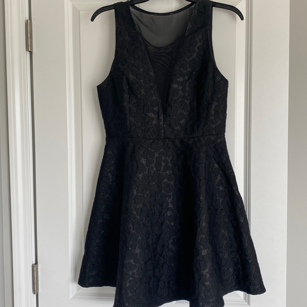 Black A line plunge dress with mesh. Size M. Worn once for NYE!